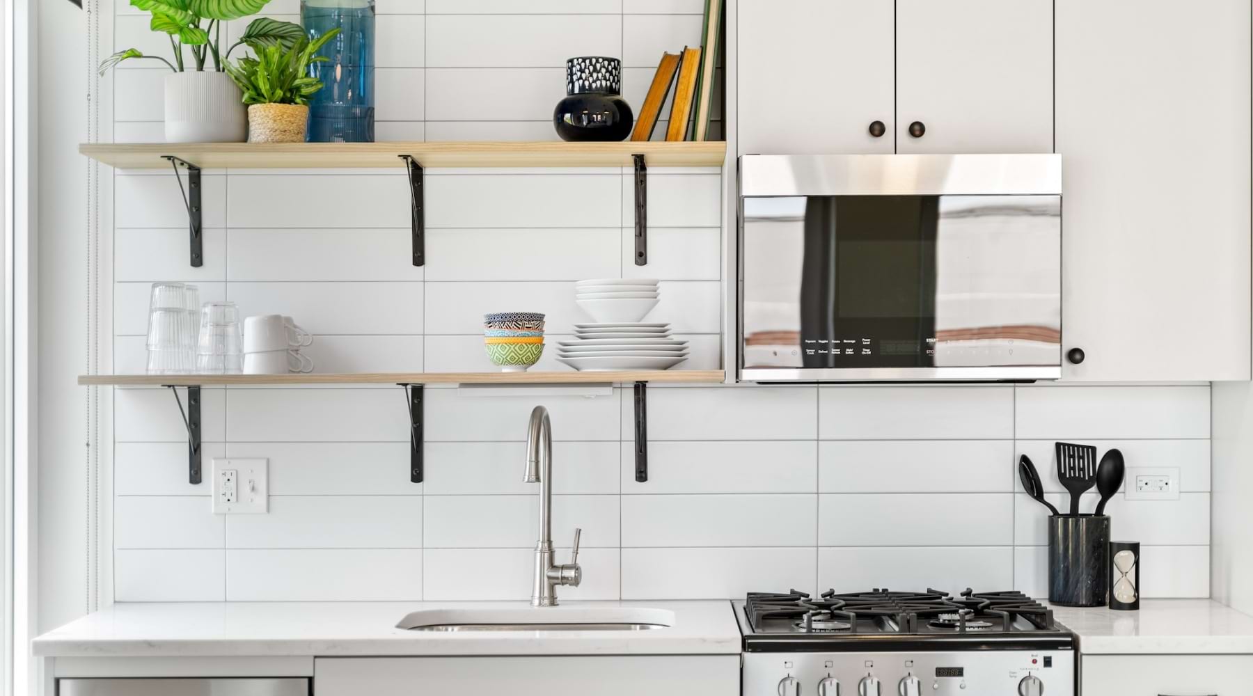 kitchen showing counterspace and bright lighting and modern appliances